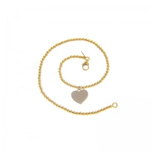 Bracciale Charm Gioielli Valenza Mazzoni con catena a Palline in oro Giallo e pendete a forma di Cuore in oro Bianco Lucido
